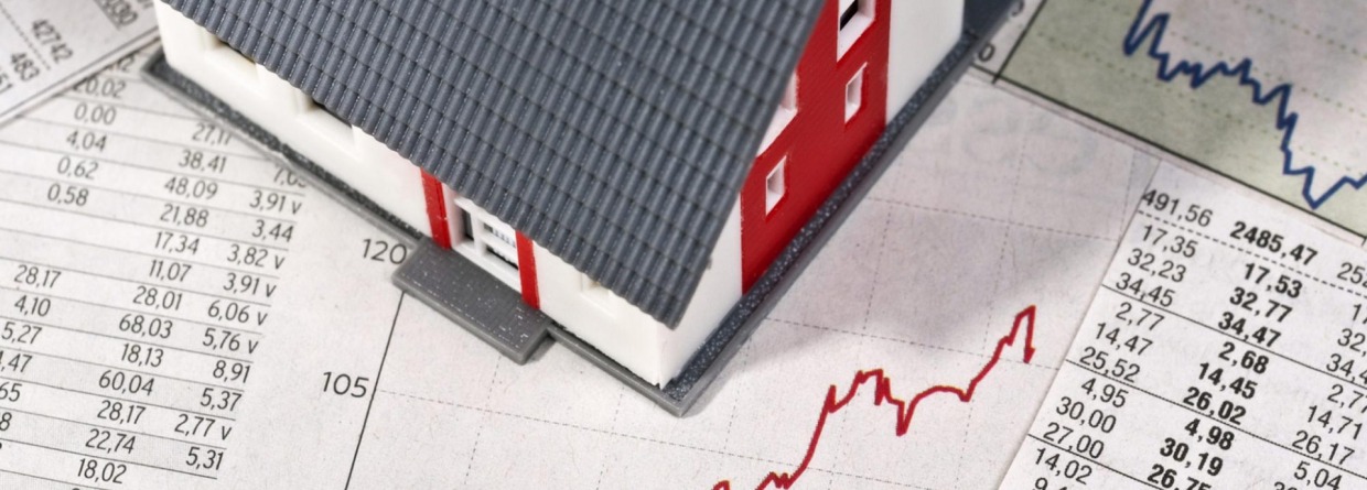Model huis op papier met grafiek